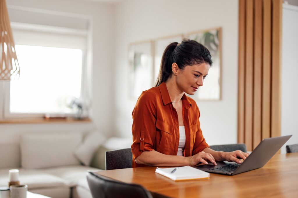 A woman working on her laptop