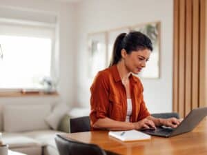 A woman working on her laptop